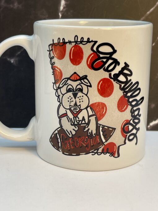 Sip in style with our Georgia Bulldogs Mascot Go Bulldogs Mug! It's the perfect #cupofmood because it’s always a great day to be a Dawg!