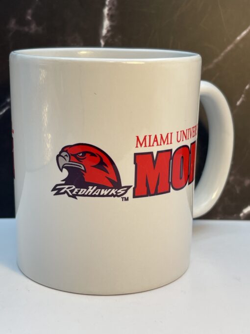 Start your mornings with the Miami RedHawks Mom Ceramic Coffee Mug! It's the perfect #cupofmood of school spirit and caffeine delivery system.