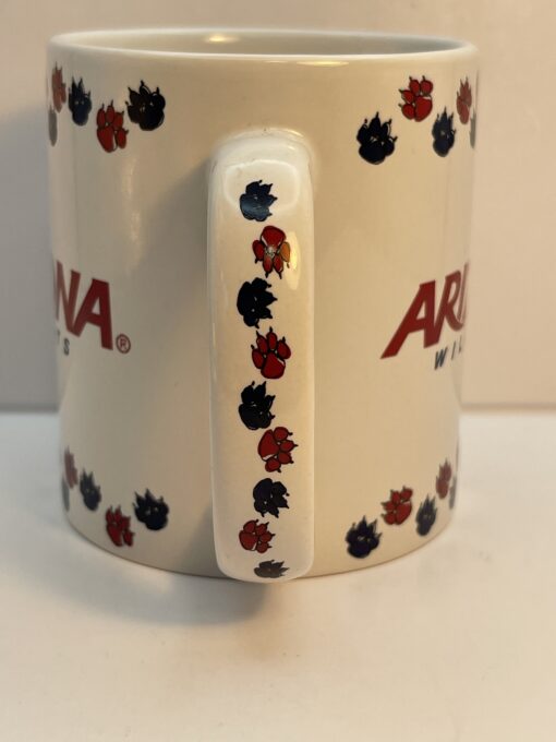 Get your paws on this adorable Arizona Wildcats Paw Print Coffee Mug! It's the perfect #cupofmood to show off your Wildcat pride with every sip!