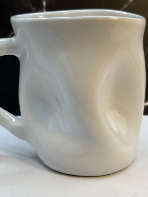 Say hello to witty sips—with the Papel Over the Hill Retirement Coffee Mug. It's the perfect #cupofmood to wave goodbye to work.