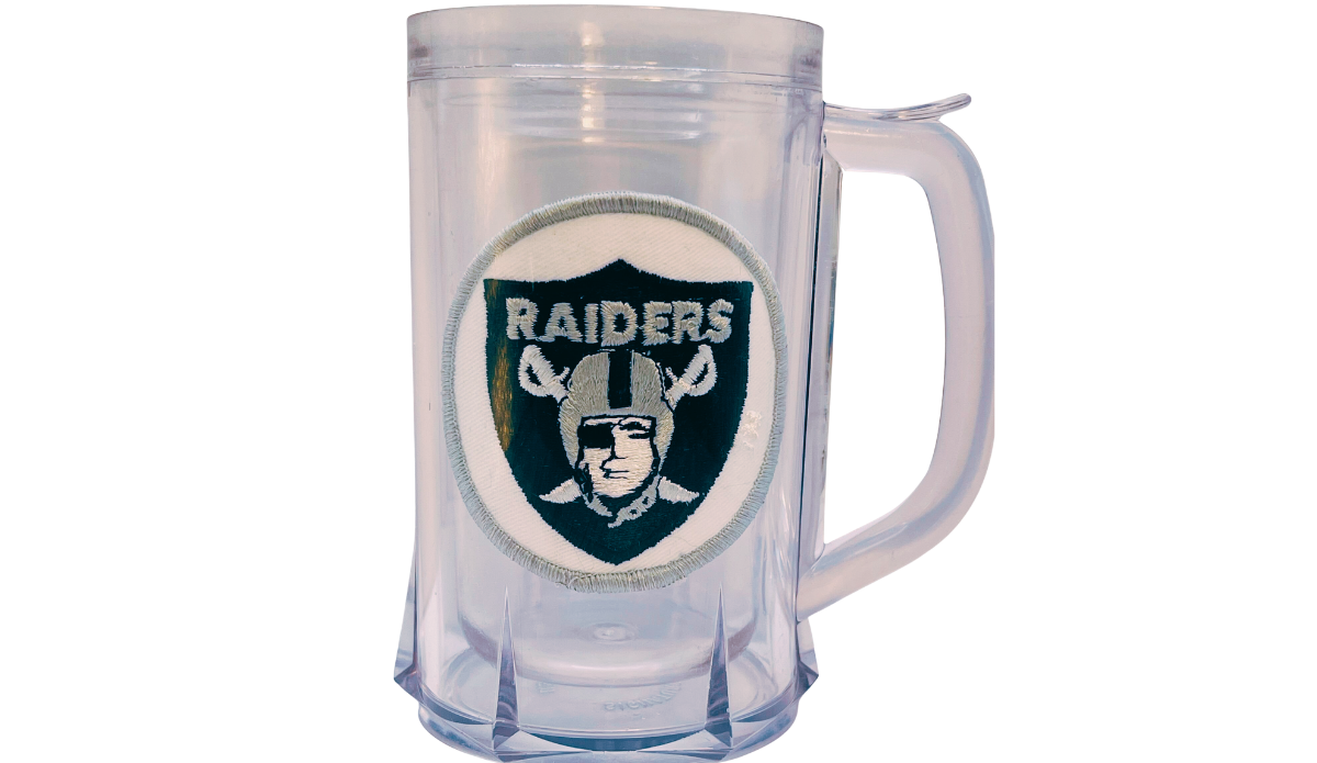 Vintage Los Angeles Raiders acrylic freezer beer mug with stitched Raiders shield patch and clear handle