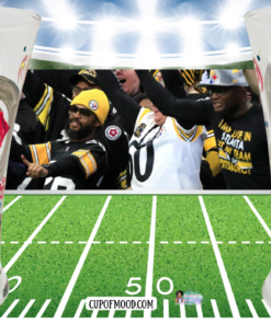 Pittsburgh Steelers Hand Painted Pilsner Glass lifestyle scene with Steelers fans in stadium setting