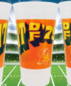 Vintage Tampa Bay Buccaneers Spirit of 79 stadium cups displayed on football field under stadium lights