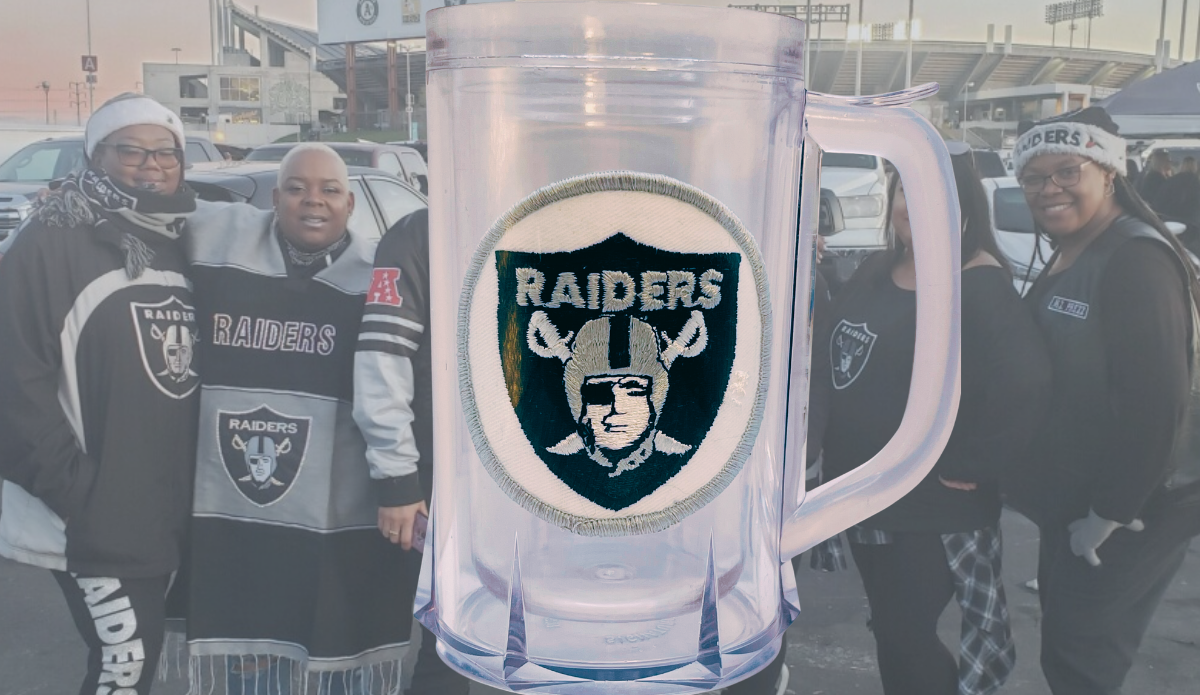 Vintage Los Angeles Raiders acrylic freezer beer mug displayed with Raiders fans in football stadium setting