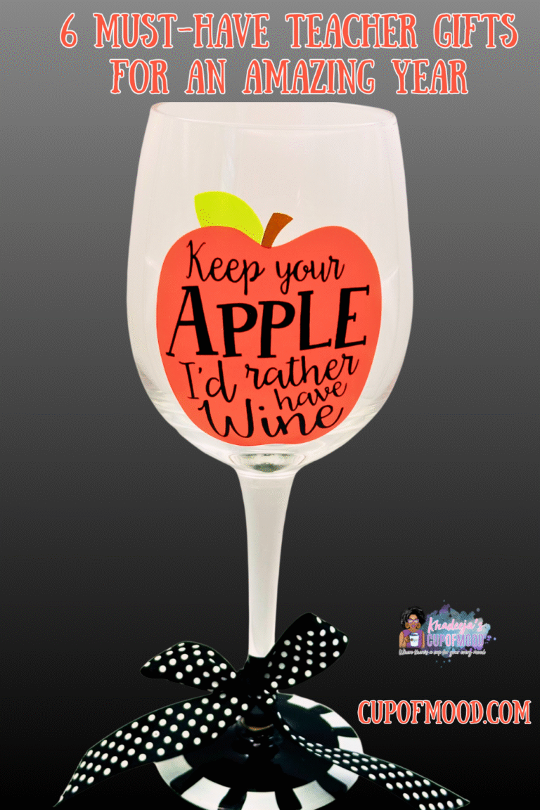 Hand-embellished 6 oz wine glass with black-and-white base, bow, and witty apple design.
