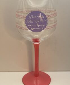 Decorative lavender wine glass with "friends are family" quote