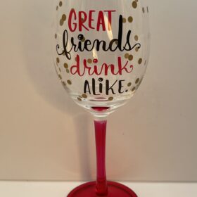 Funny wine glass with “Great Friends Drink Alike” text