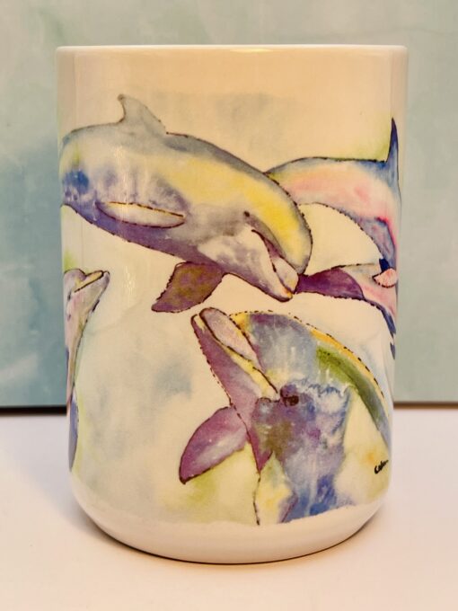 Side view showing full dolphin wrap design on the mug