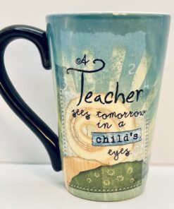 White ceramic teacher mug with sun and meadow background