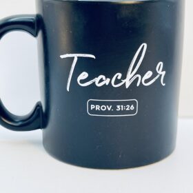 Teacher Proverbs 31:26 black ceramic mug