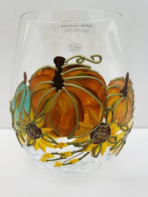 10 oz clear stemless wine glass with 3D hand-painted pumpkins and sunflowers outlined in gold