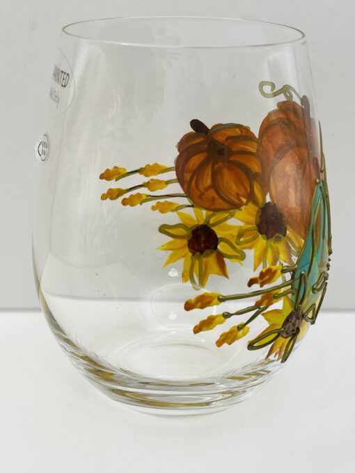 Hand-painted pumpkin and sunflower wine glass for fall décor and seasonal sipping