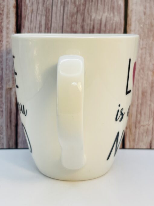 Side view Love Is All You Need mug gift idea