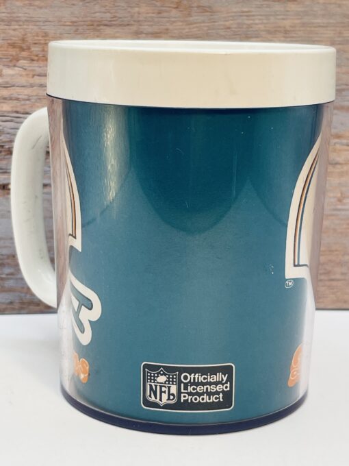 Dolphins blue background with helmet logo mug