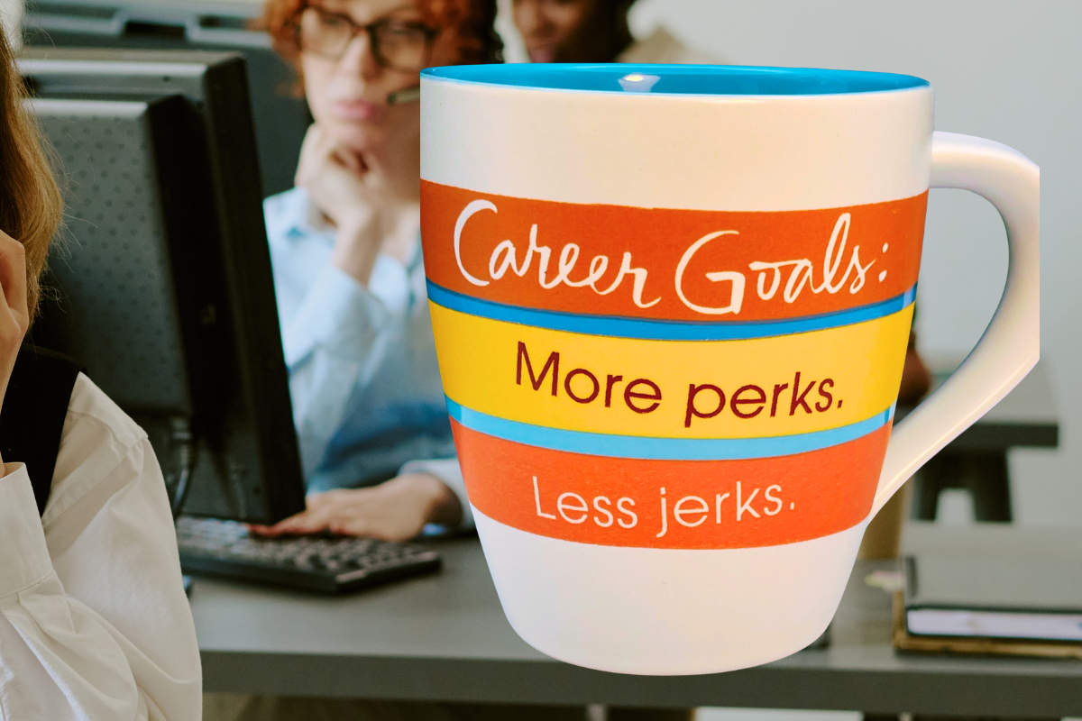 Hallmark Career Goals coffee mug with retro stripes and workplace humor on an office desk