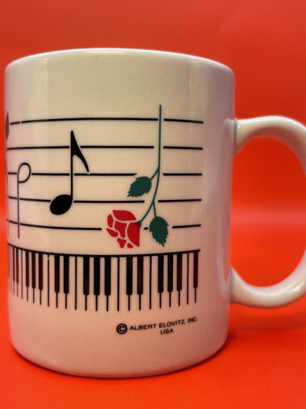 This is cute white Mug with Musical Notes. They go all around the outside of this Musical Notes Coffee Cup for Music Lovers.