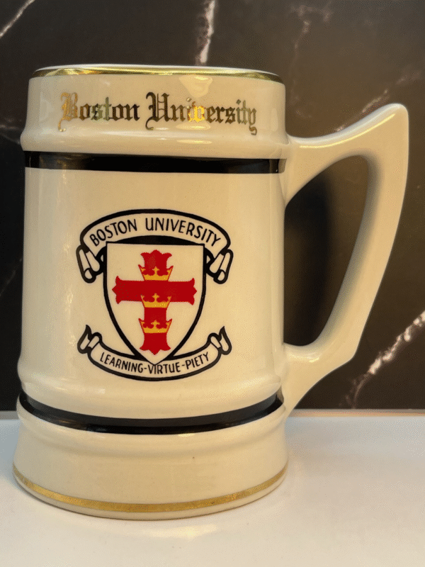 This ceramic stein proudly features “Boston University” in elegant gold lettering across the top.