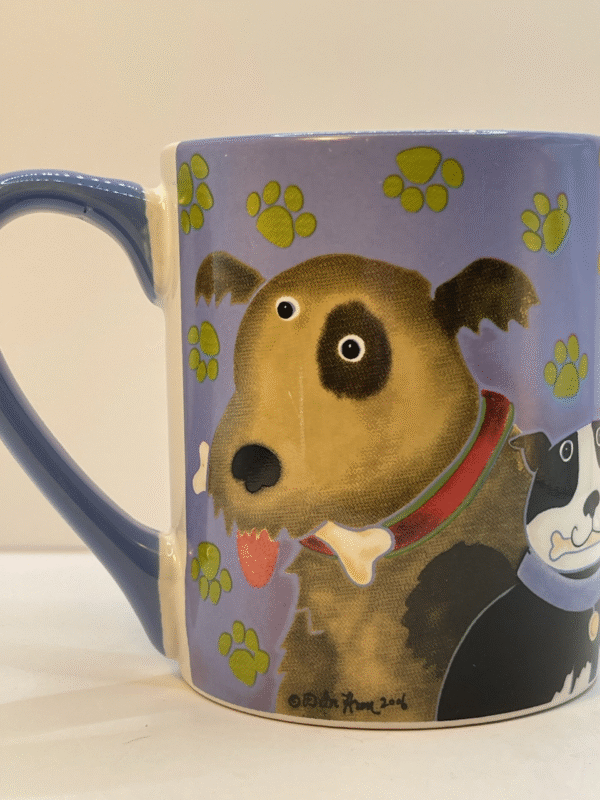 Start your day with this Debi Hron Blue Cat Dog Mug from the Cute Animals Collection. It’s the perfect #cupofmood to make every morning a fun affair!