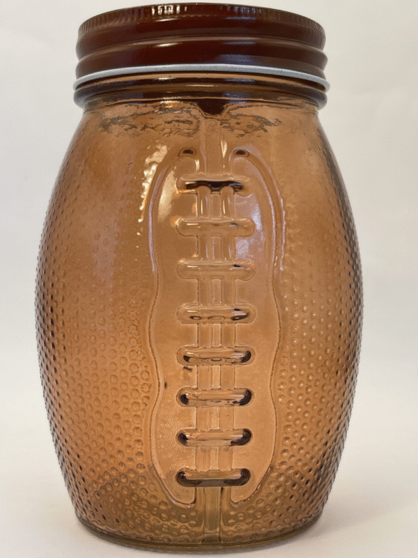 This unique 20-ounce brown glass jar is shaped just like a football. Complete with 3D laces on the front. And a textured surface that mimics the real deal.