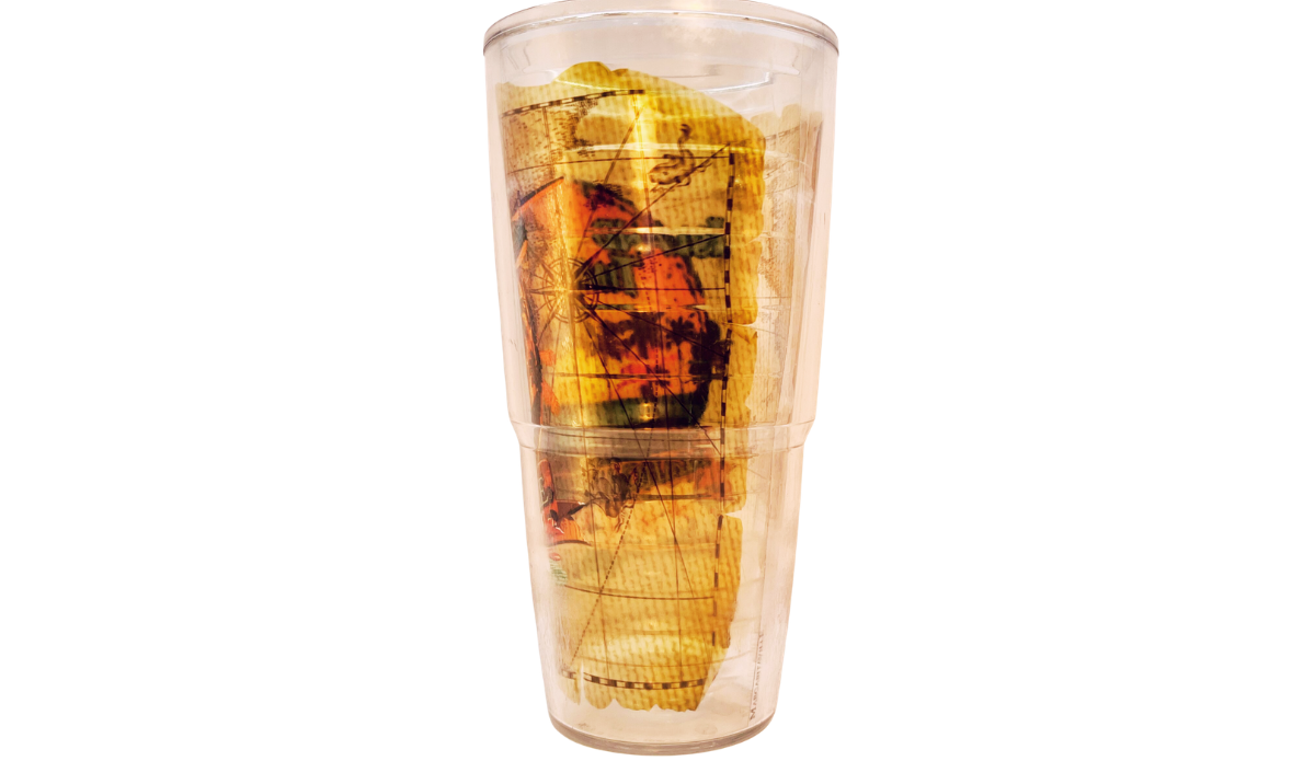 Side view of Tervis Margaritaville Island Time Tumbler with compass and tropical sunset artwork