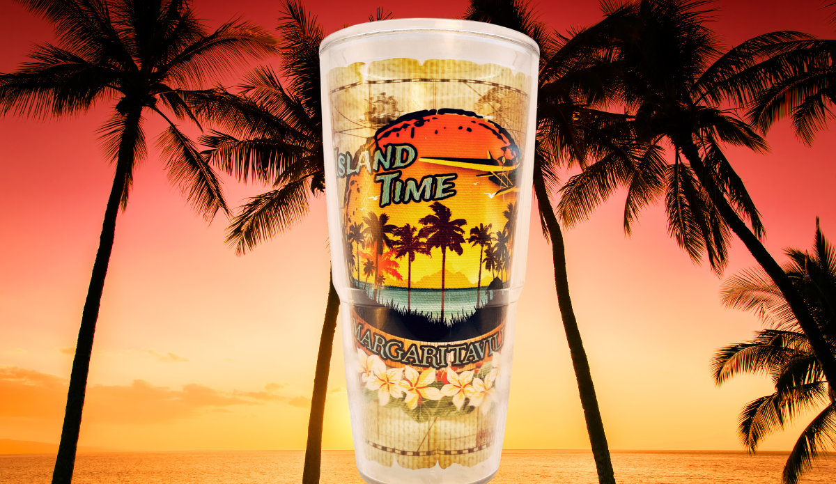 Tervis Margaritaville Island Time Tumbler displayed against a tropical sunset beach backdrop