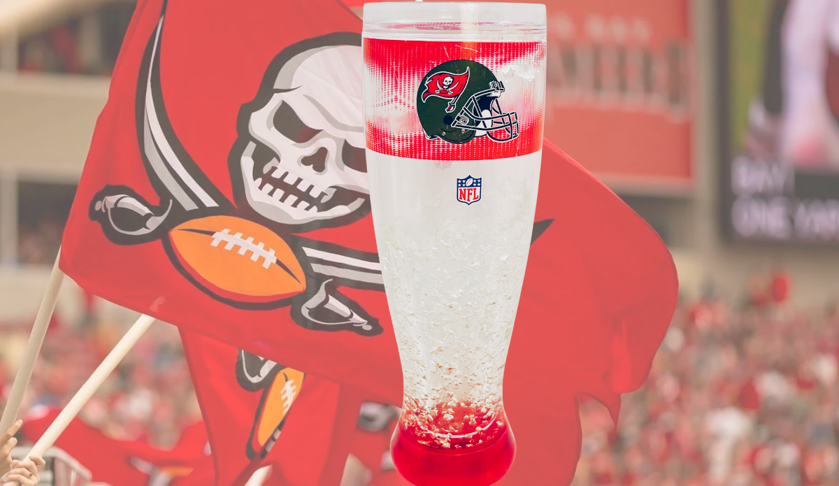 Tampa Bay Buccaneers freezer pilsner glass displayed with large Buccaneers flag at football stadium