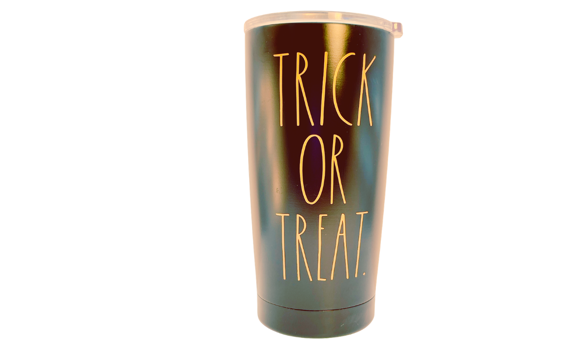 Rae Dunn Trick or Treat Tumbler front view with orange lettering, matte black finish, and clear lid