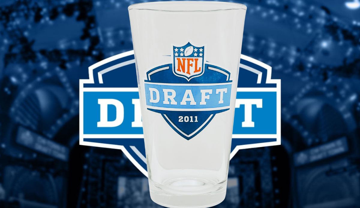 2011 NFL Draft Bud Light Pint Glass displayed in NFL Draft football lifestyle scene
