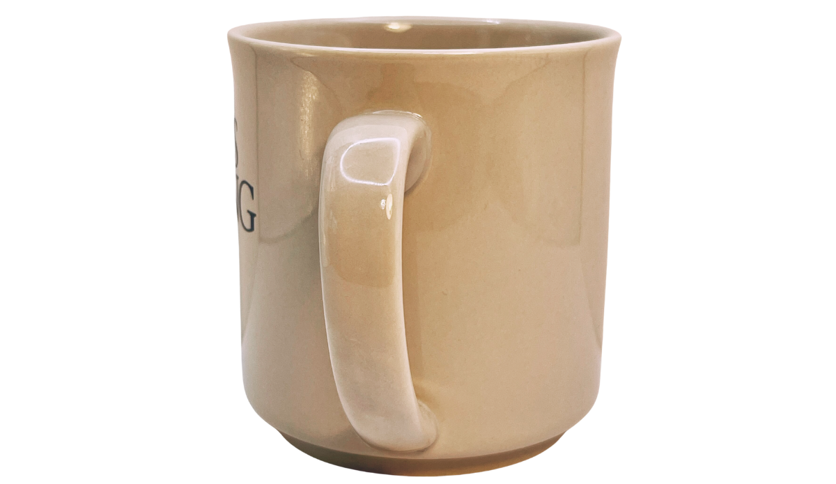 3D Eyeball Mug handle view showing the curved cream ceramic handle and smooth glazed body.