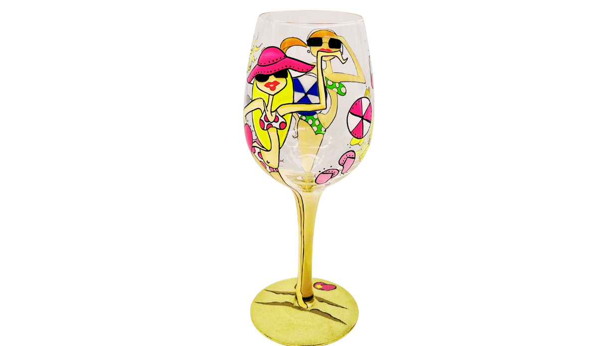 Beach Girls Hand Painted Wine Glass featuring blonde beach girl in pink sun hat and pink swimsuit