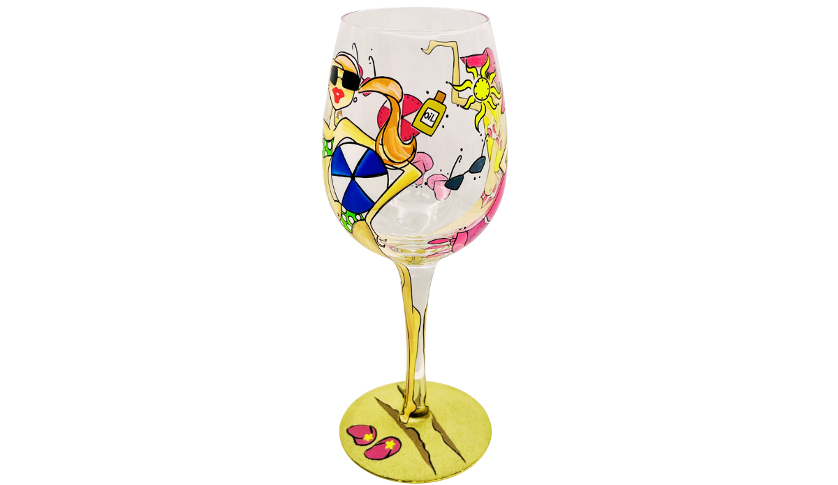Beach Girls Hand Painted Wine Glass showing two different beach girls in separate wraparound beach scenes