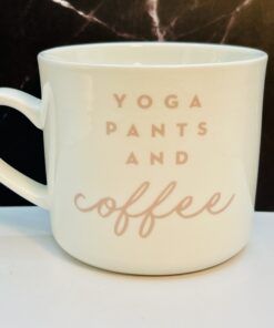 White stoneware mug with pink lettering for coffee