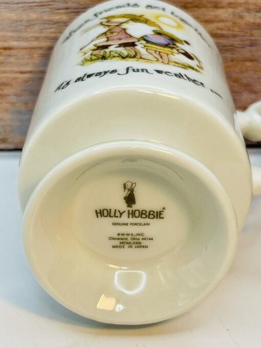 Holly Hobbie pedestal mug with “Fun Weather” quote