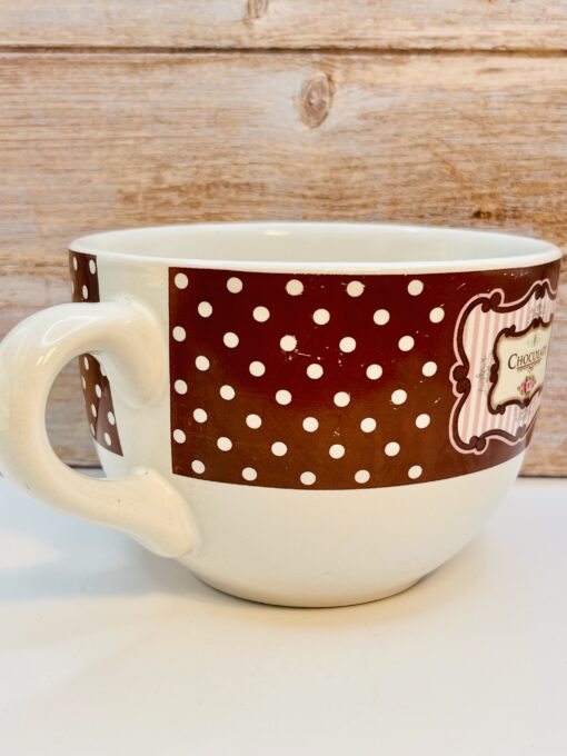White ceramic chocolate mug with floral motif