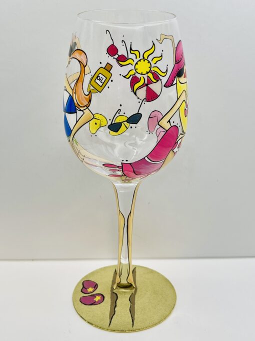 Vibrant seaside wine glass with whimsical hand-painted accents