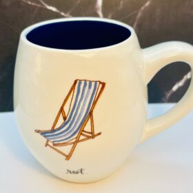 Rae Dunn ceramic mug with beach chair design
