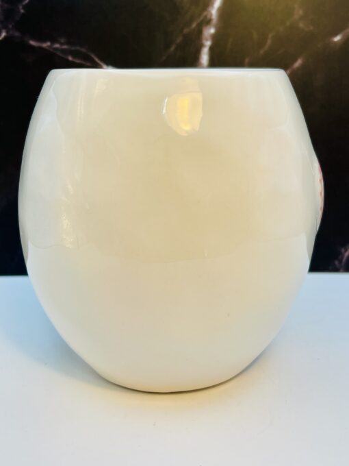 Rae Dunn ceramic mug with raised heart design