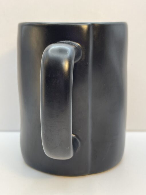 Rae Dunn black coffee mug with white lettering