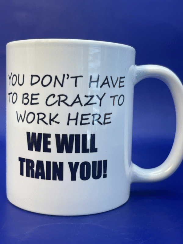 Indulge in the whimsy of office life with the Crazy Work Here Mug.