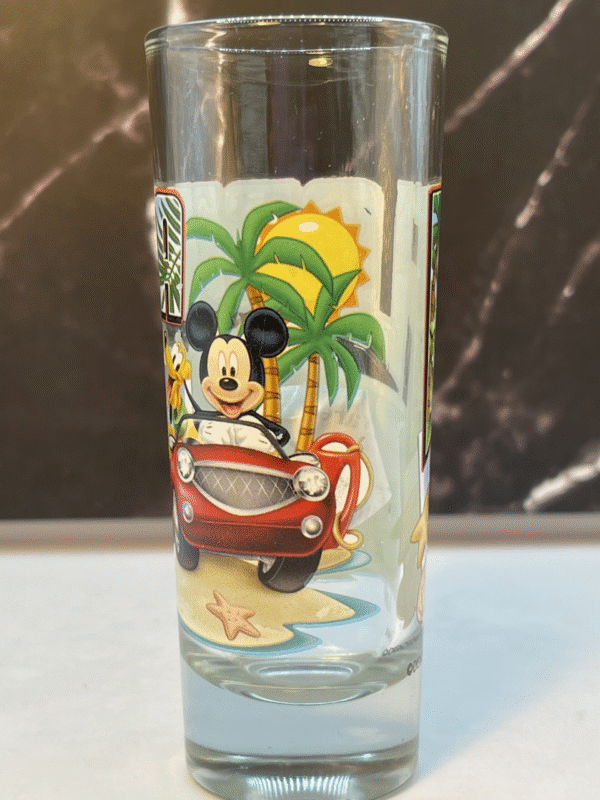 Raise a glass to the magic of Disney with the Disney Florida Tall Shot Glass. It’s the perfect #cupofmood and your ticket to sunshine and Disney magic!
