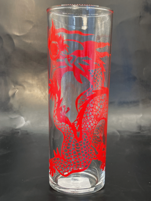 Unleash your inner dragon with the fierce and fiery Red Dragon Highball Glass! 