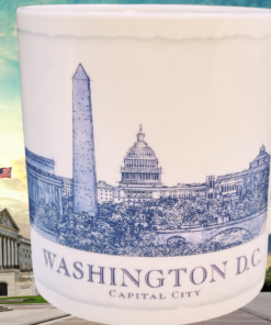 Starbucks Washington D.C. Architecture Mug displayed with U.S. Capitol and Washington skyline background