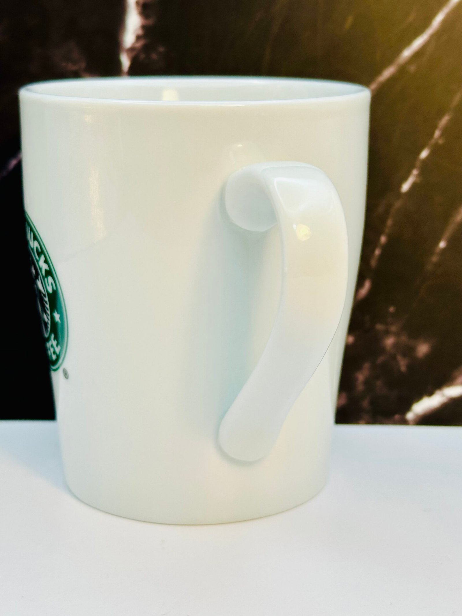 Vintage Starbucks white ceramic mug with green siren