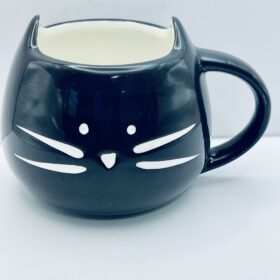 Stylized black cat mug with ears and whiskers