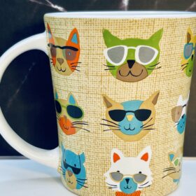 Whimsical cat coffee mug with sunglasses