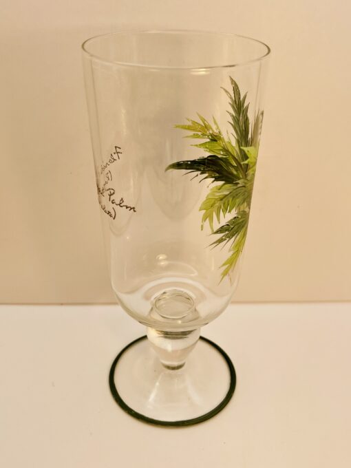 Hand-painted palm tree wine goblet with green base
