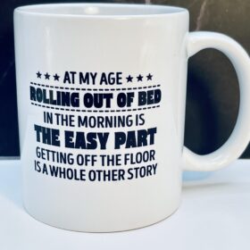 White 11 oz ceramic mug with humorous phrase