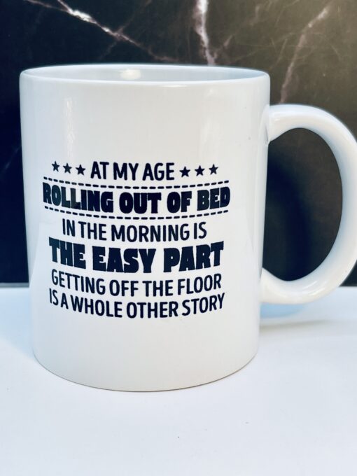 White 11 oz ceramic mug with humorous phrase