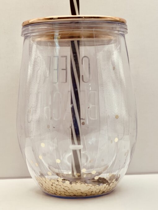 Holiday drinkware with “CHEERS BEACHES” gold lettering