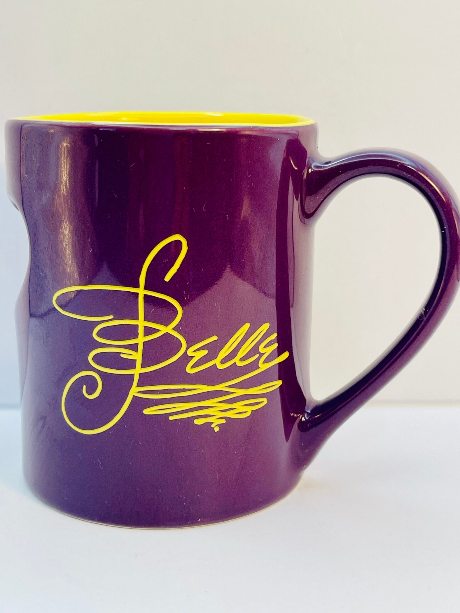 Disney collectible mug featuring Belle in yellow gown
